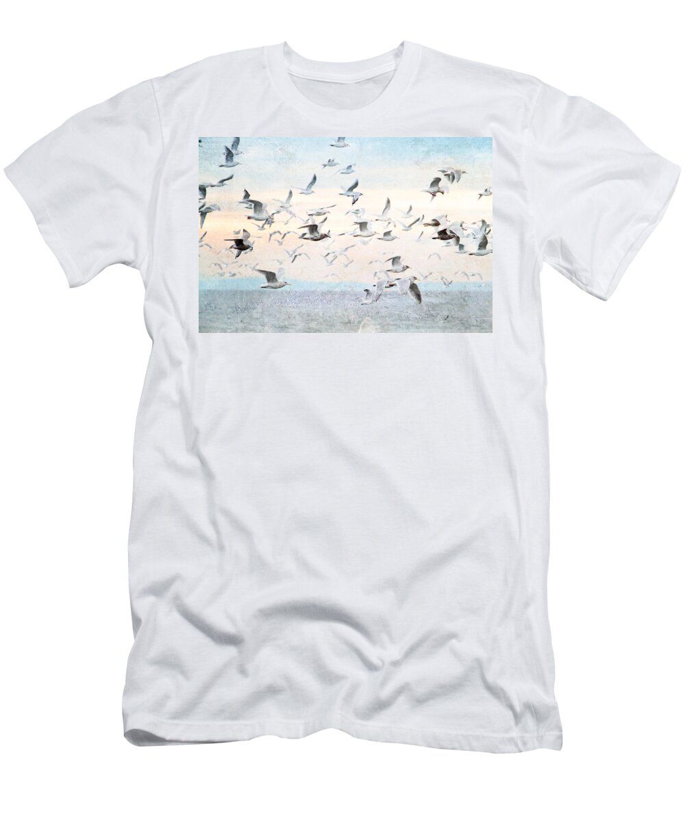 Gulls T-Shirt featuring the photograph Gulls Flying Over the Ocean by Peggy Collins
