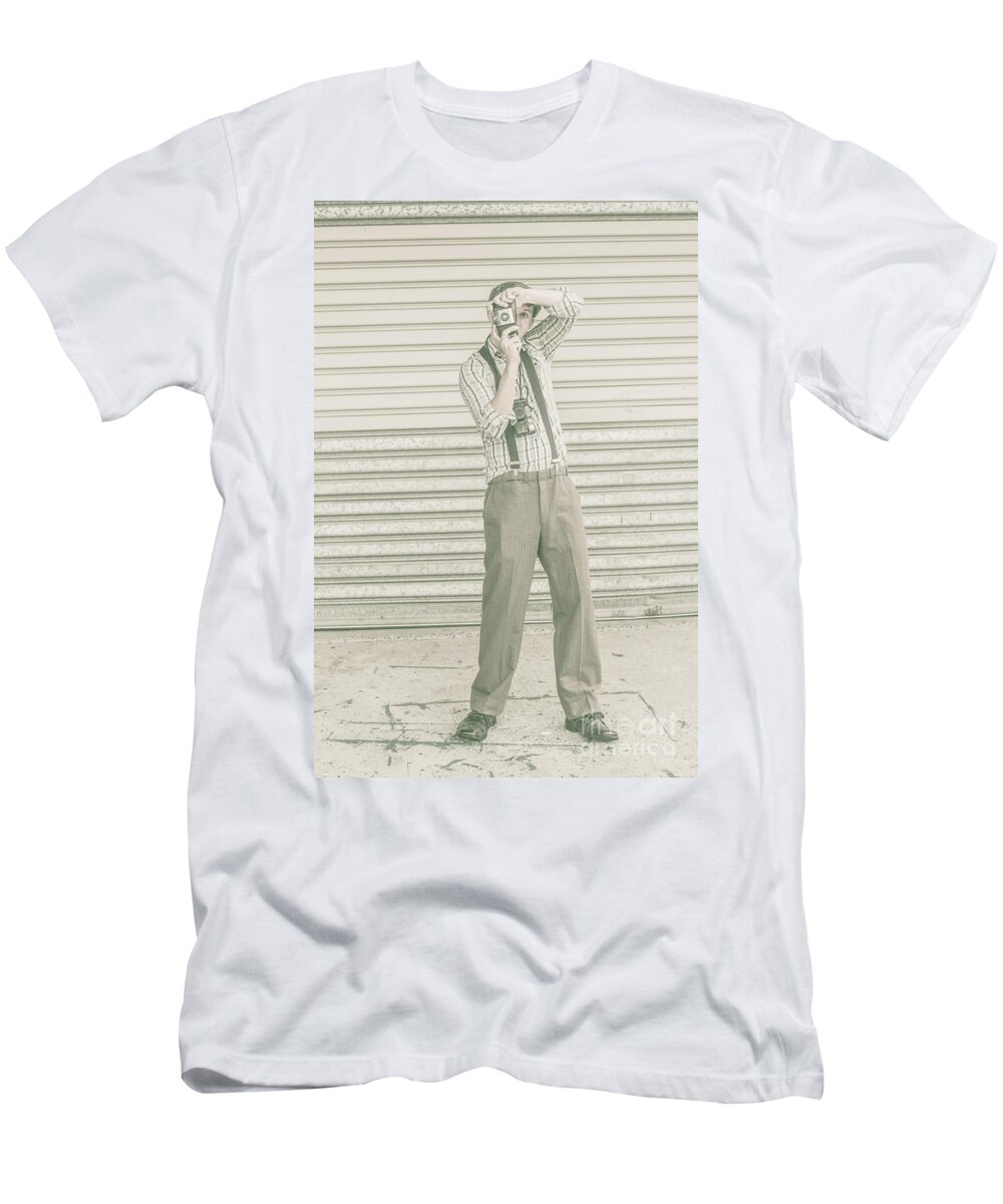 Camera T-Shirt featuring the photograph Photojournalist with a retro camera by Jorgo Photography