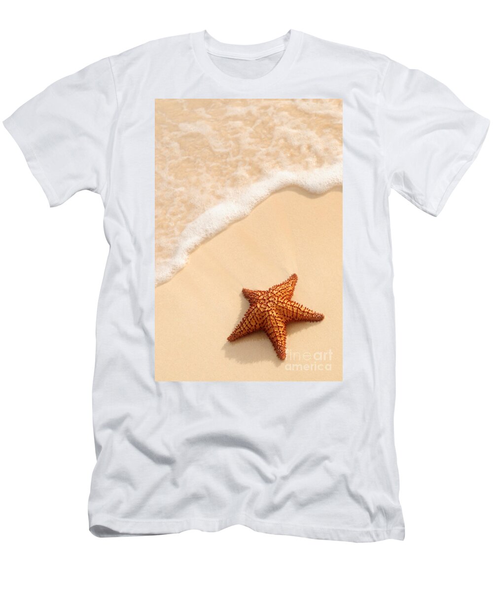 Starfish T-Shirt featuring the photograph Starfish and ocean wave by Elena Elisseeva
