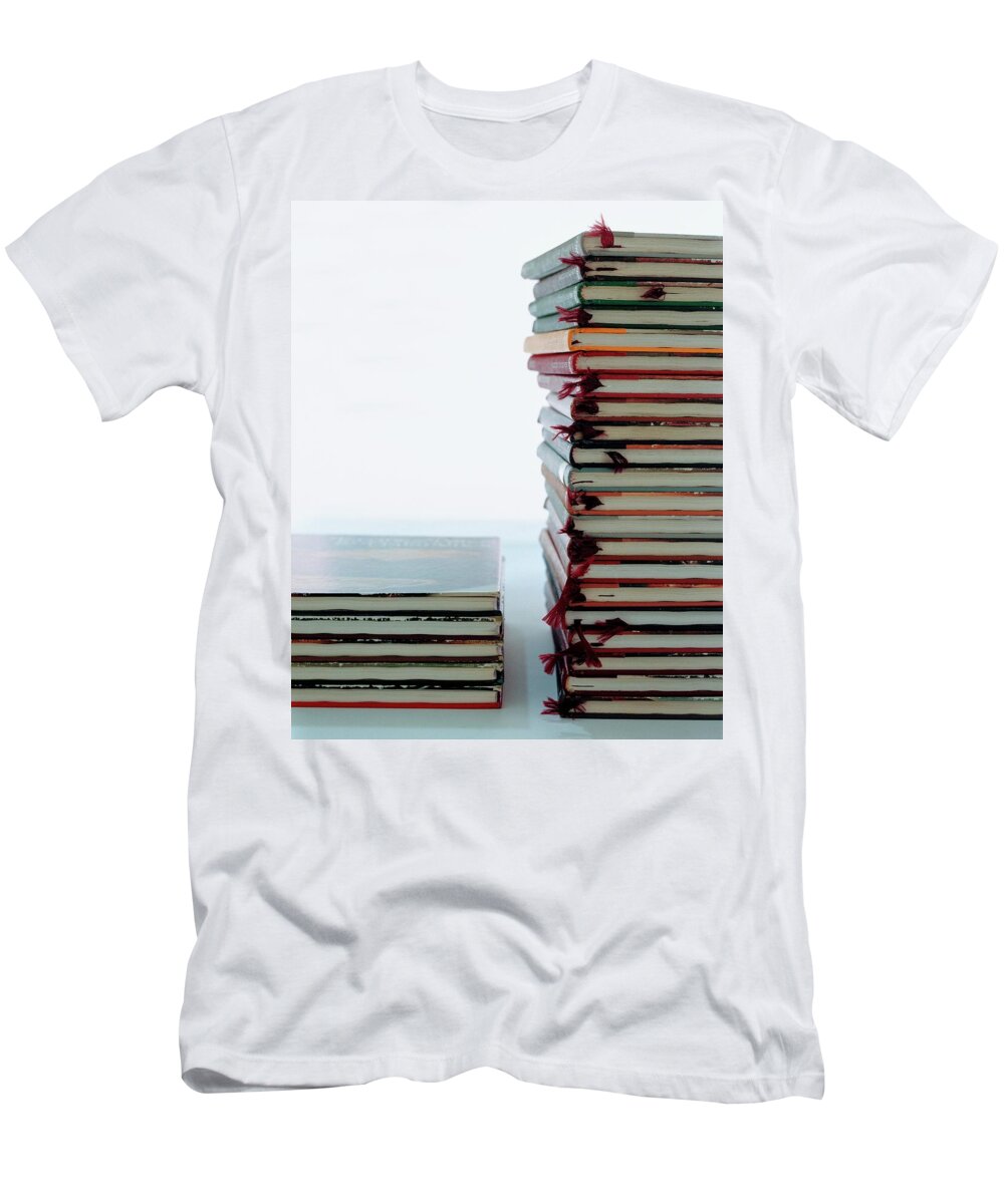 Arts T-Shirt featuring the photograph Two Stacks Of Books by Romulo Yanes
