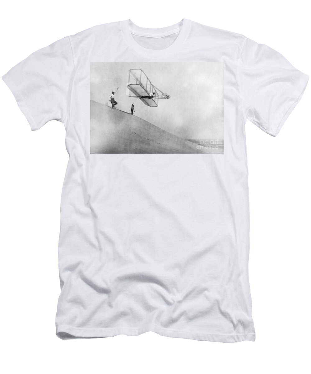 History T-Shirt featuring the photograph Wilbur Wright Pilots Early Glider 1901 by Science Source