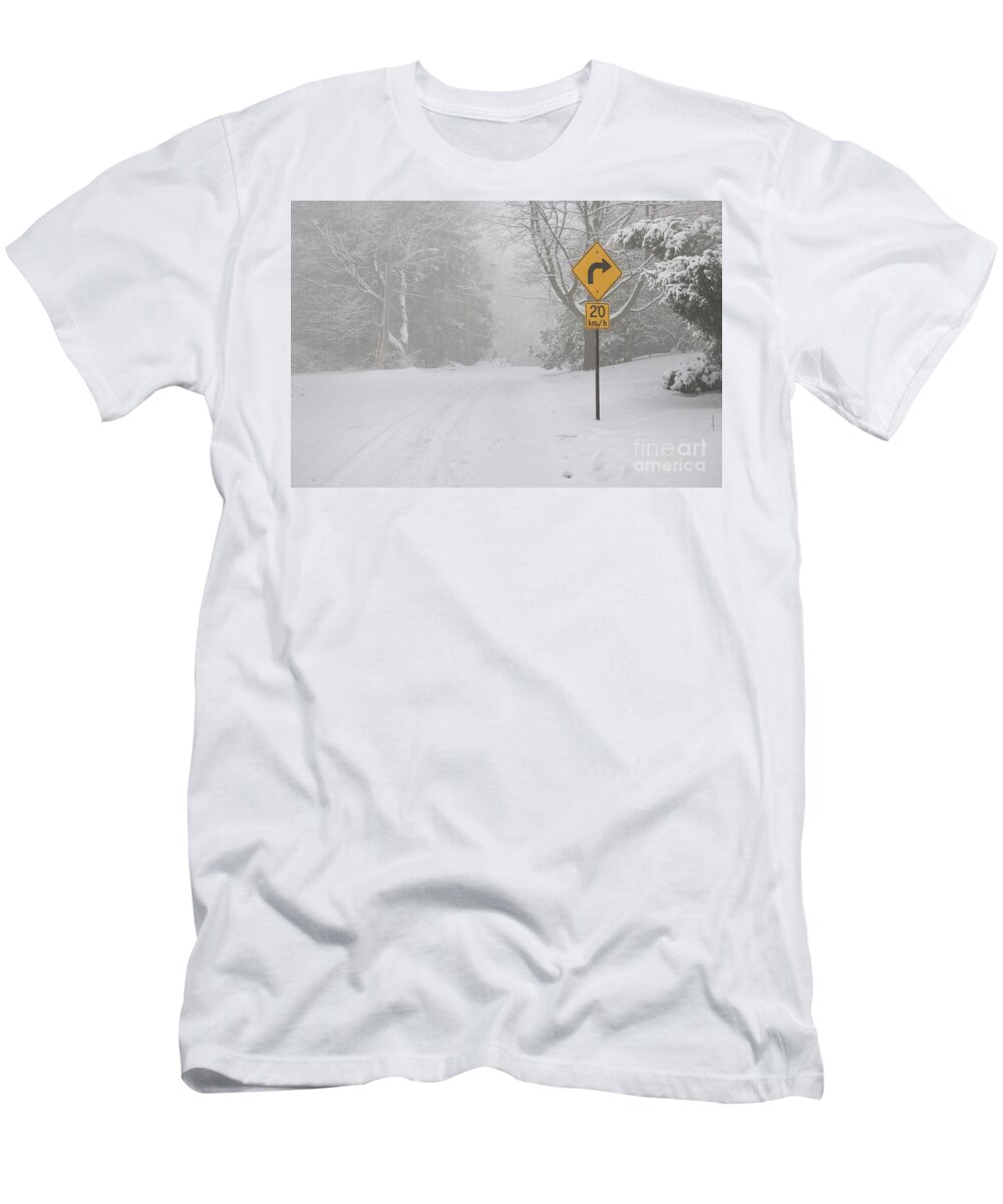 Winter T-Shirt featuring the photograph Winter road with yellow sign by Elena Elisseeva