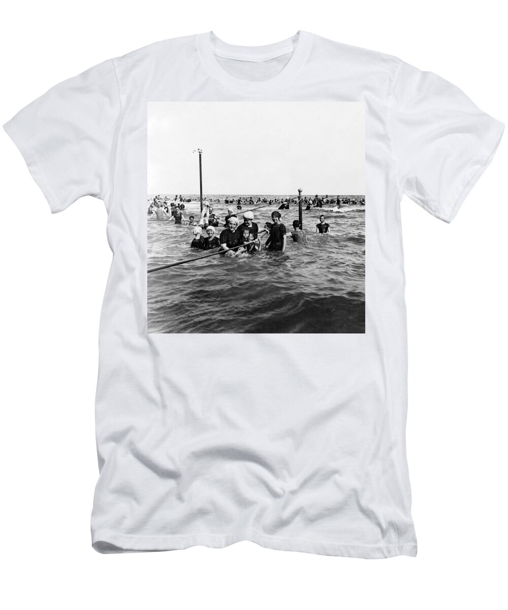 Galveston T-Shirt featuring the photograph Bathing in the Gulf of Mexico - Galveston Texas c 1914 by International Images