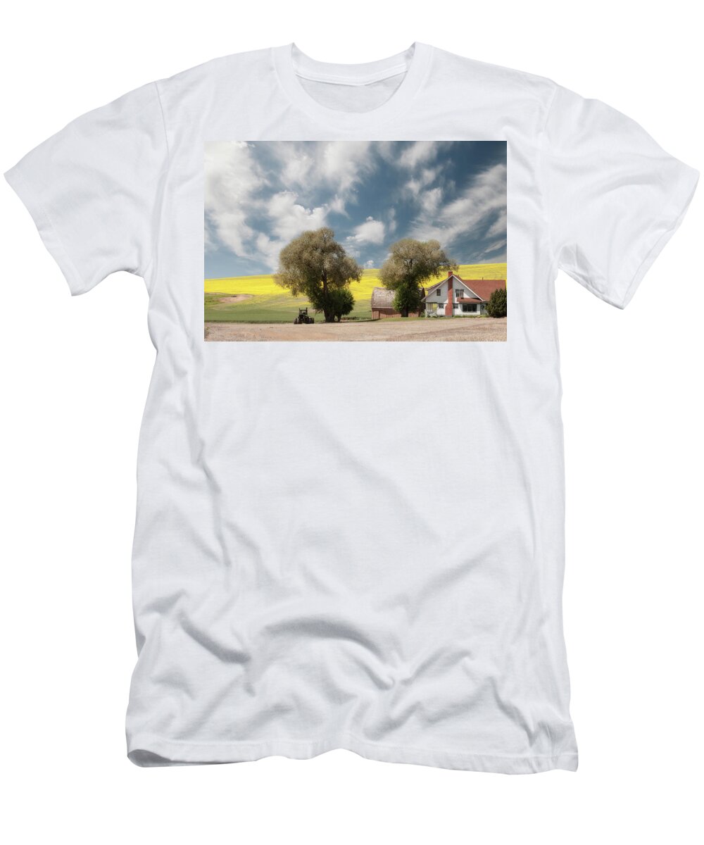 Agriculture T-Shirt featuring the photograph A farmhouse against a dramatic sky. by Usha Peddamatham