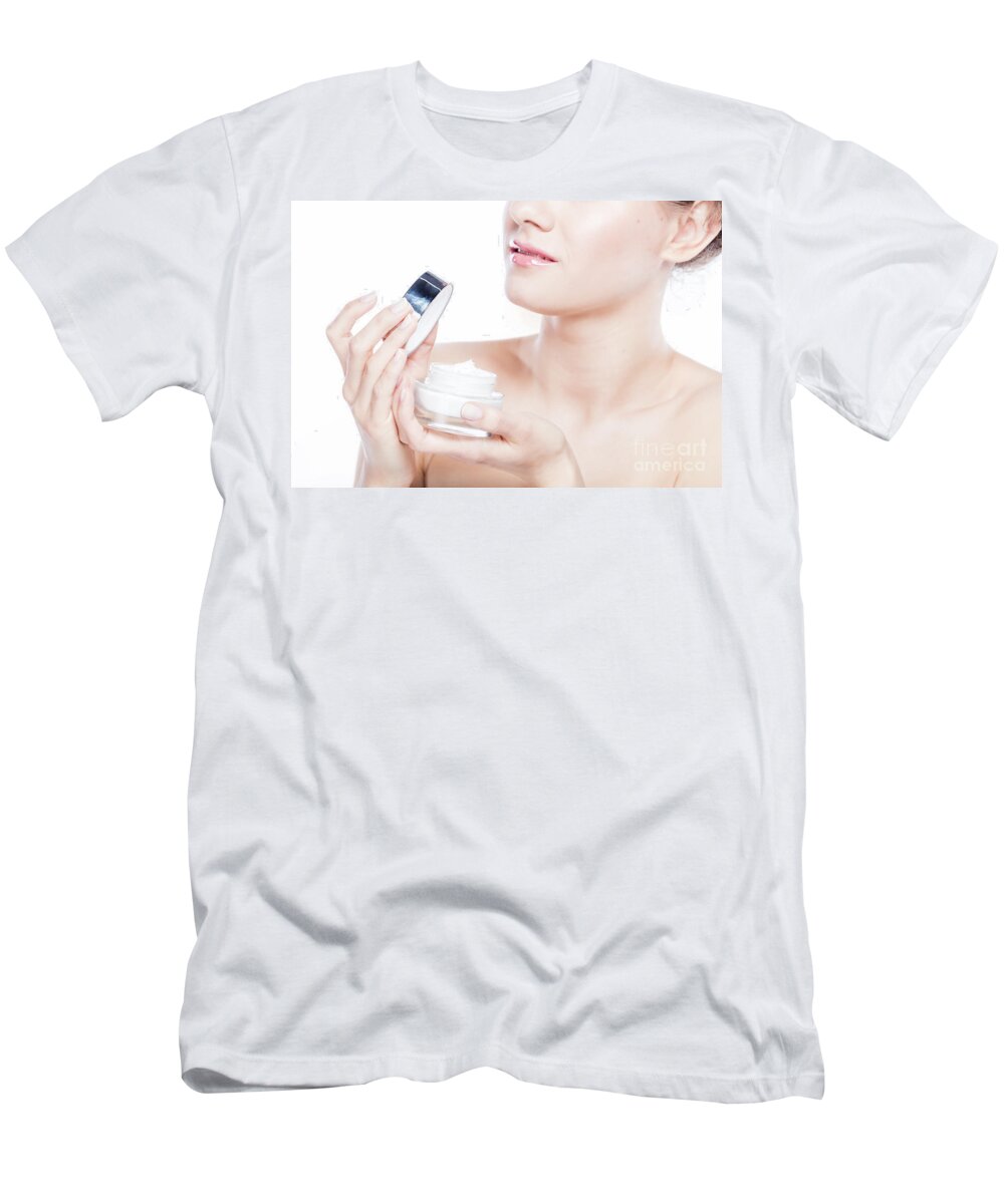 Skincare T-Shirt featuring the photograph Attractive woman opening a face cream. by Michal Bednarek