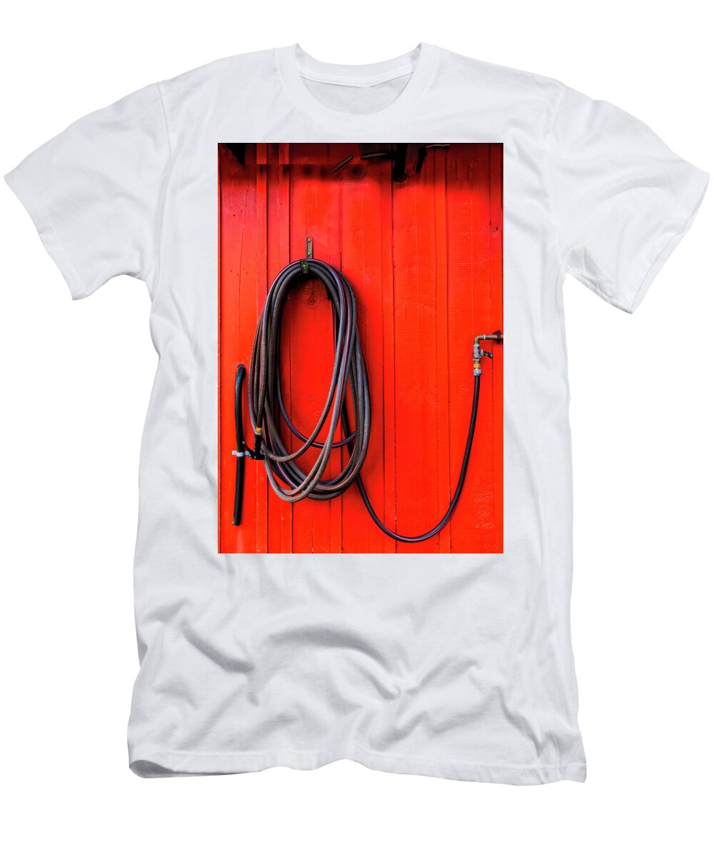 South Freeport Harbor Maine T-Shirt featuring the photograph Black Hose Red Wall by Tom Singleton