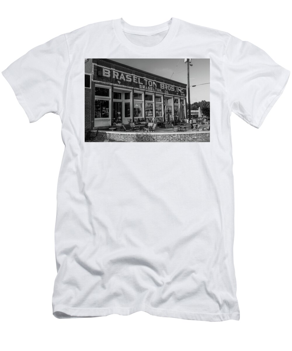 Braselton T-Shirt featuring the photograph Braselton Bros Inc. Store Front in BW by Doug Camara