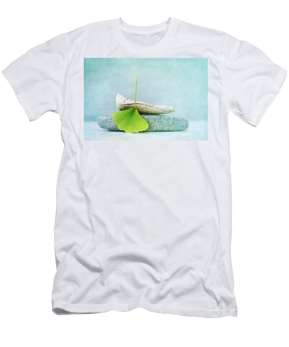 Leaf T-Shirt featuring the photograph Driftwood Stones And A Gingko Leaf by Priska Wettstein