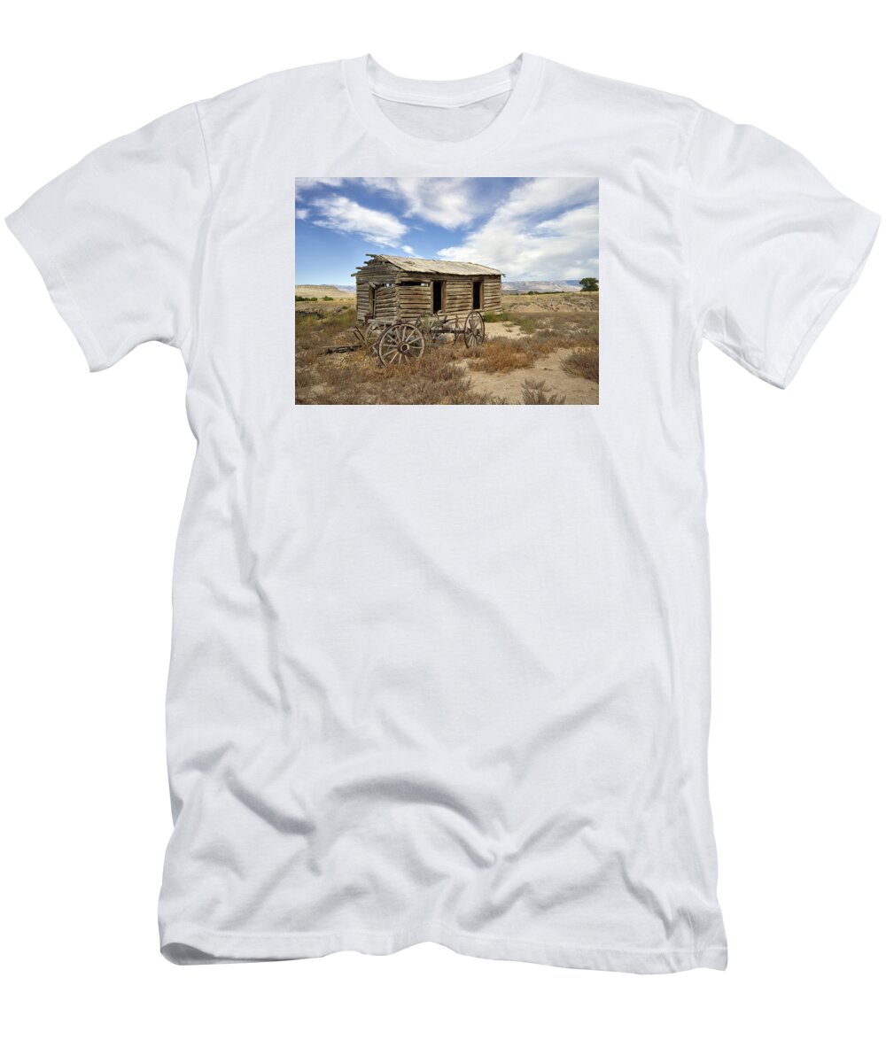 Carol M. Highsmith T-Shirt featuring the photograph Historic cabin and buckboard wheels in Big Horn County in Wyoming by Carol M Highsmith