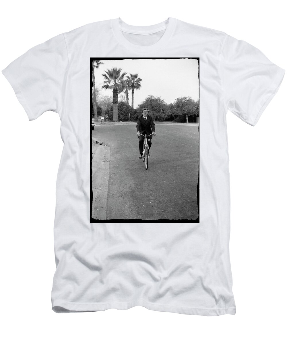 Lawyer T-Shirt featuring the photograph Lawyer on a Bicycle, 1971 by Jeremy Butler