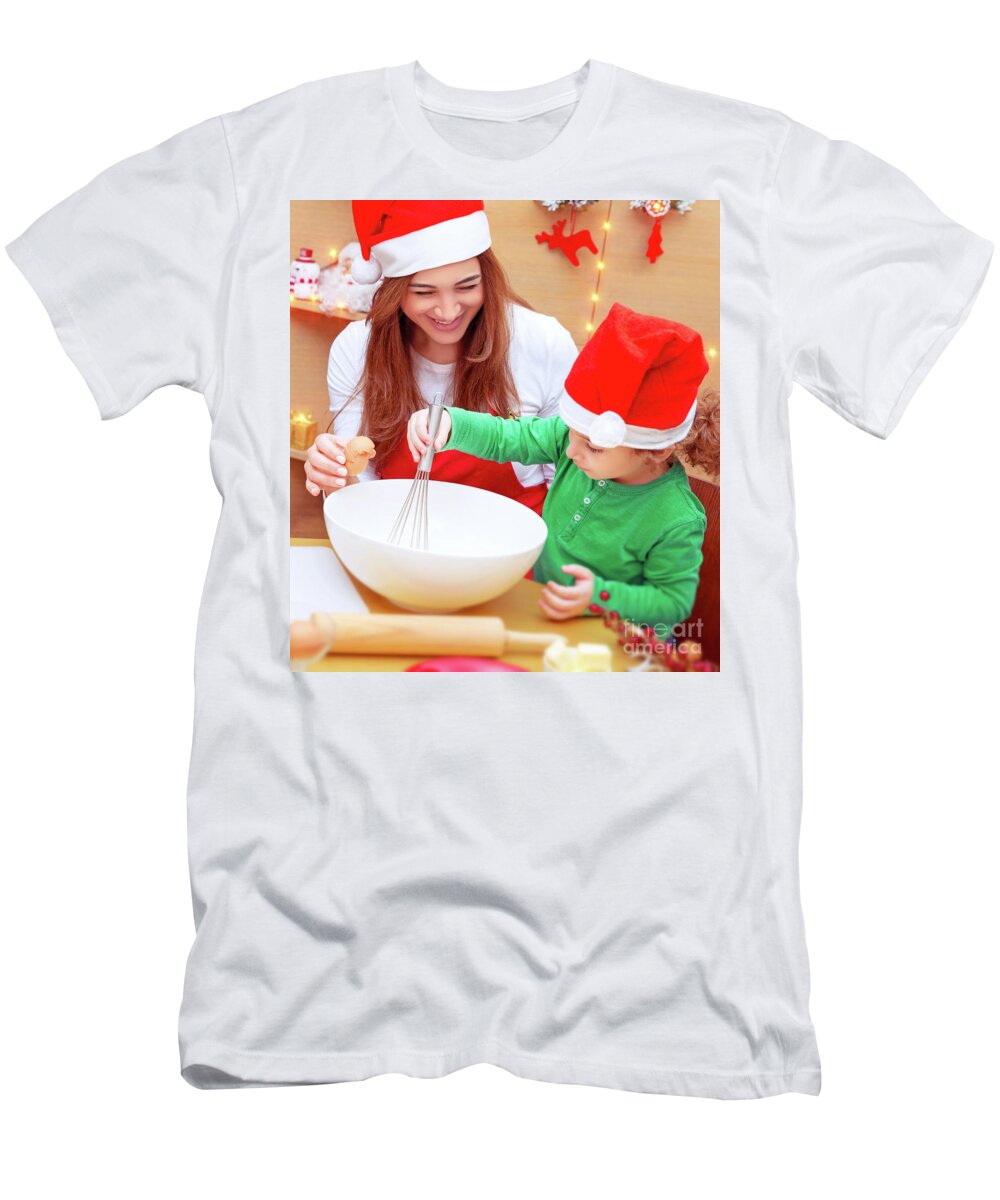 Baby T-Shirt featuring the photograph Mother with son baking Christmas cookies by Anna Om