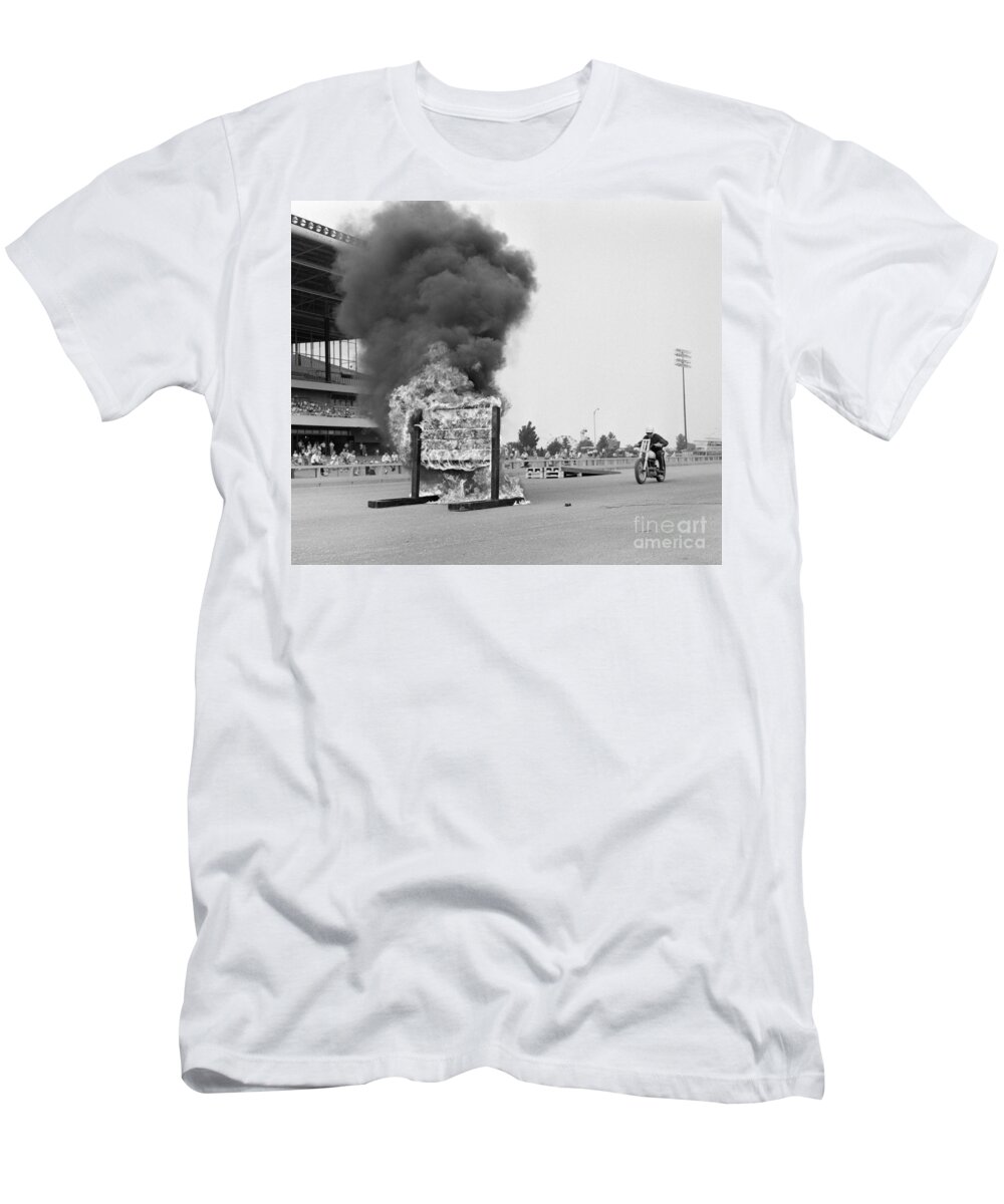1960s T-Shirt featuring the photograph Motorcycle Stunt, C.1960s by H. Armstrong Roberts/ClassicStock