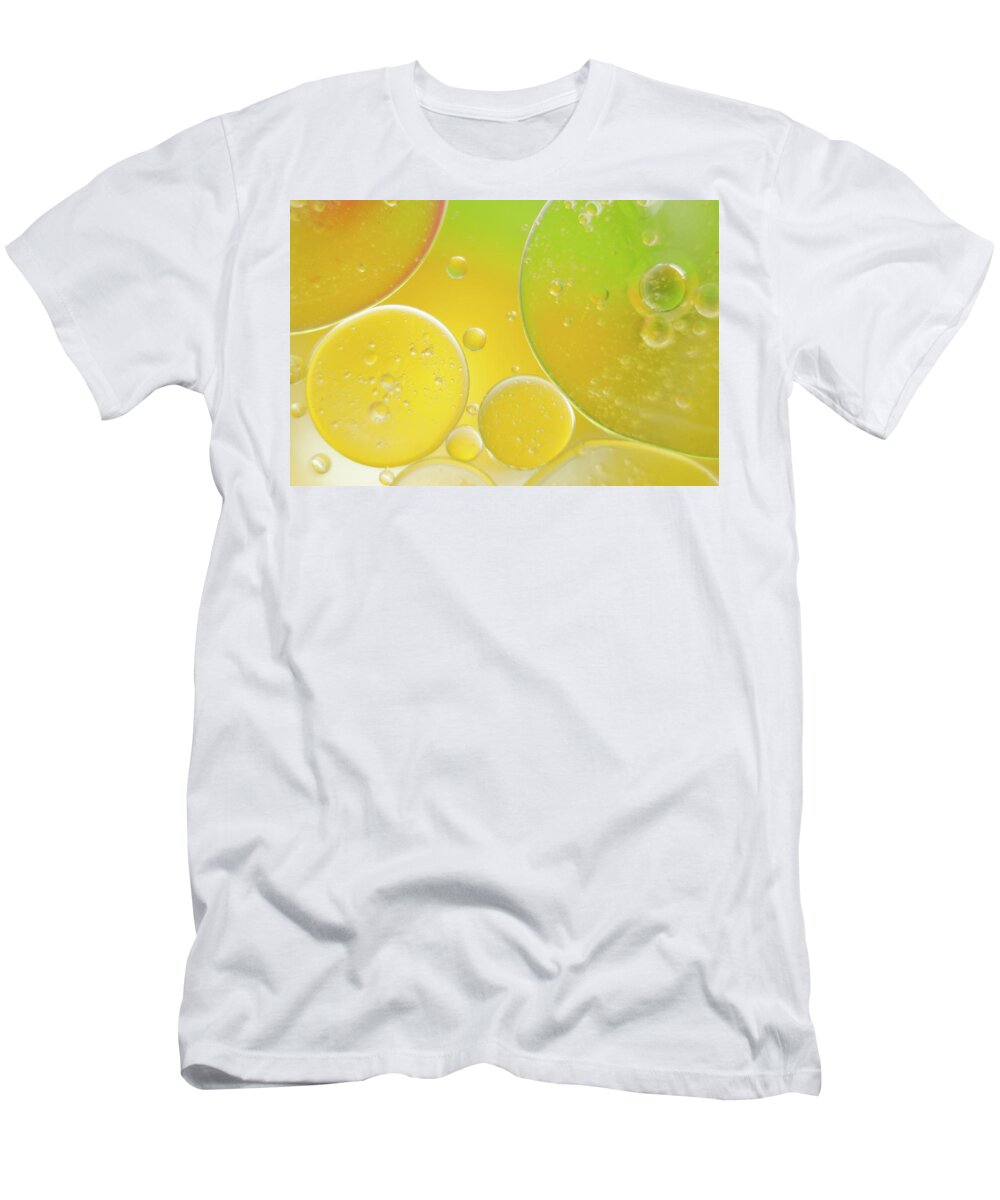 Water T-Shirt featuring the photograph Oil and water bubbles by Andy Myatt