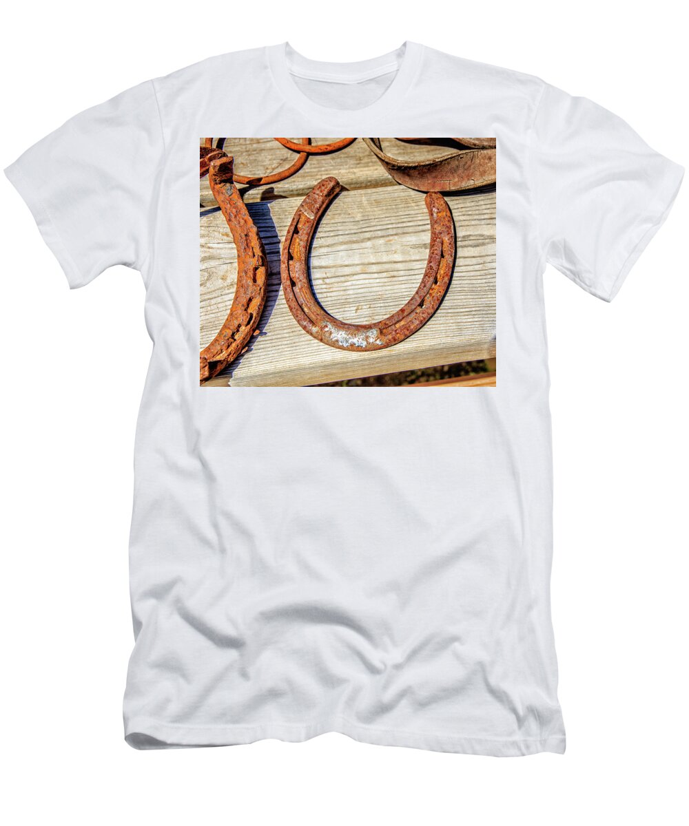 Architecture T-Shirt featuring the photograph Rusty Horseshoes Found by Curators of the Ghost Town of St. Elmo by Peter Ciro