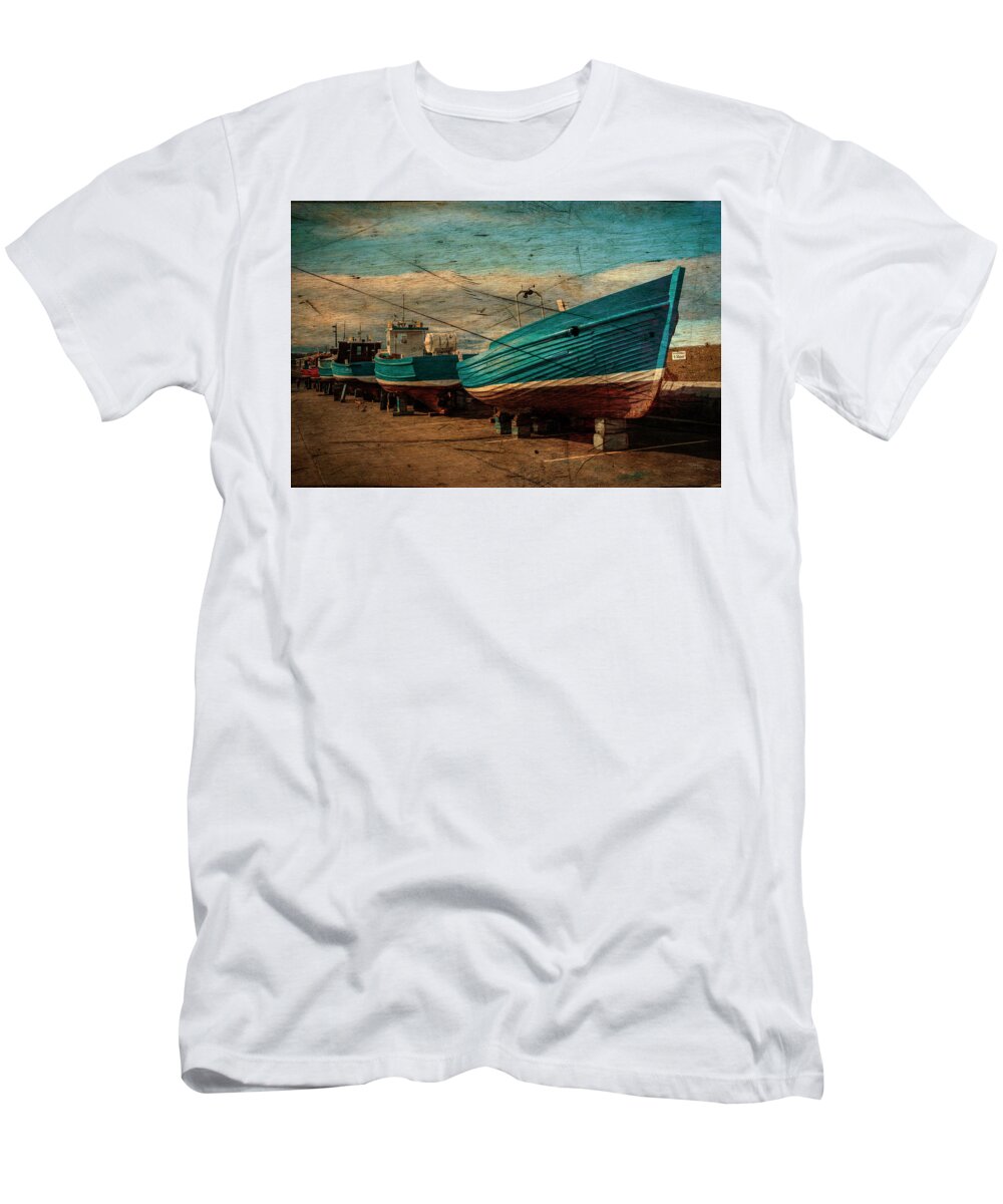 Boat T-Shirt featuring the photograph Seahouses Boats hauled out for Winter. by John Paul Cullen