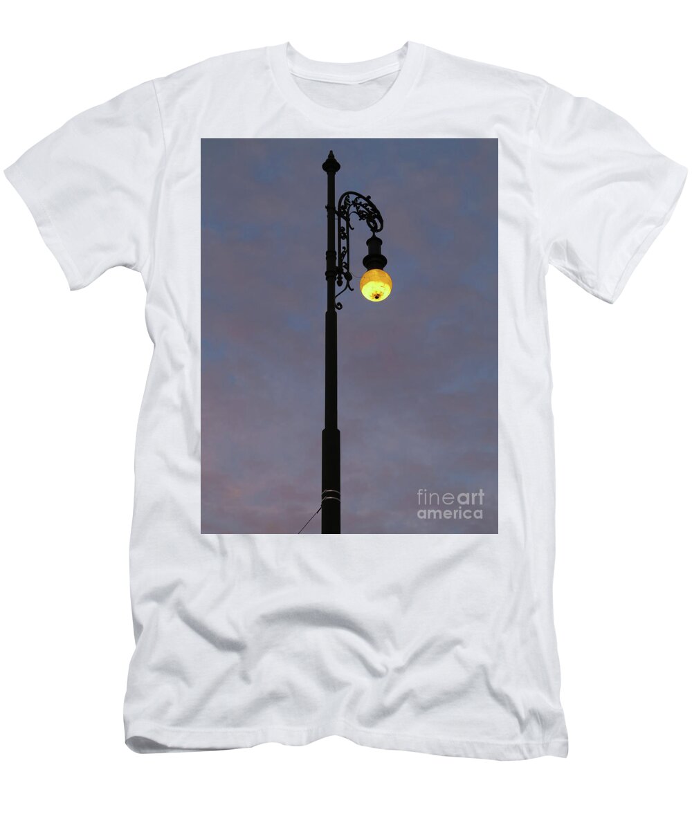Shining T-Shirt featuring the photograph Street lamp shining at dusk by Michal Boubin