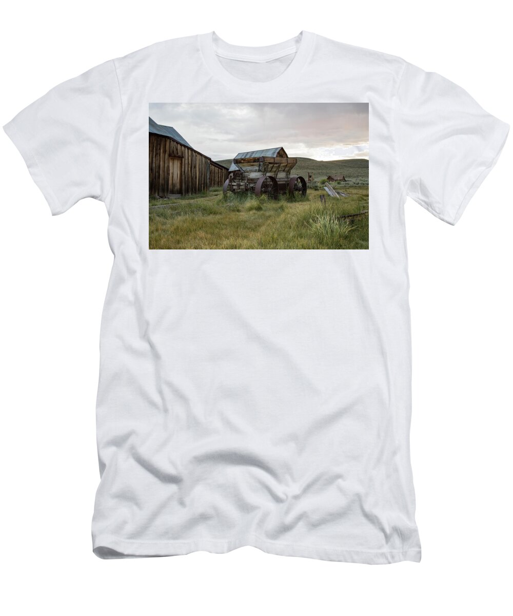 Abandoned T-Shirt featuring the photograph Wooden wagon in field, Bodie, California by Karen Foley