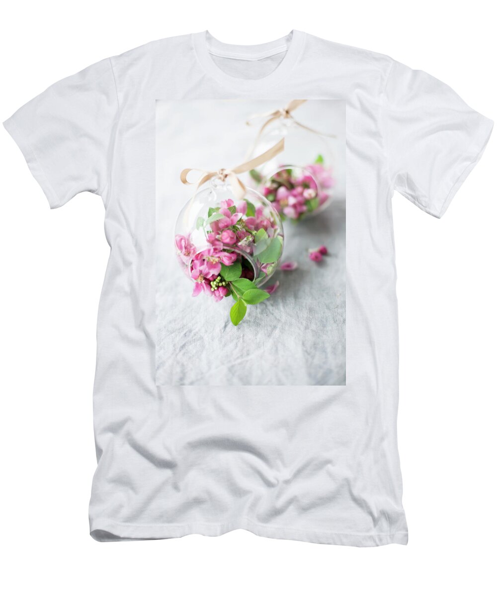 Ip_12499044 T-Shirt featuring the photograph Crab Apple Blossom In Glass Baubles To Be Hung From Ribbons by Alicja Koll