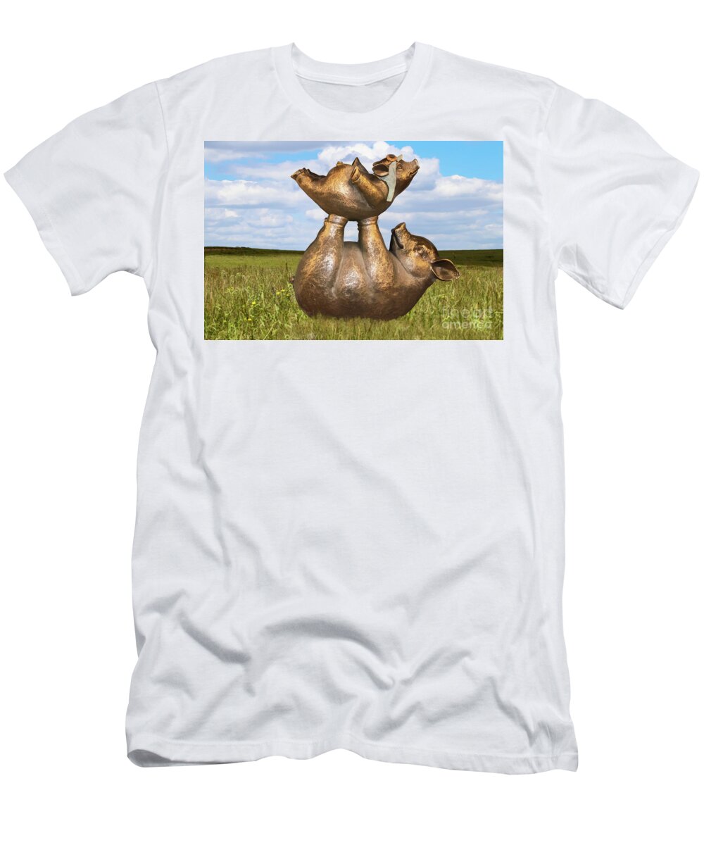 Pigs In Clover T-Shirt featuring the digital art Teaching a pig to fly - mother pig in grassy field holds up baby pig with flying helmet to teach it by Susan Vineyard