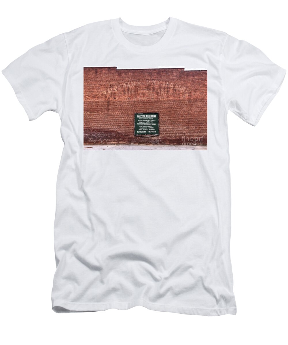 Tire T-Shirt featuring the photograph The Tire Exchange by Flavia Westerwelle
