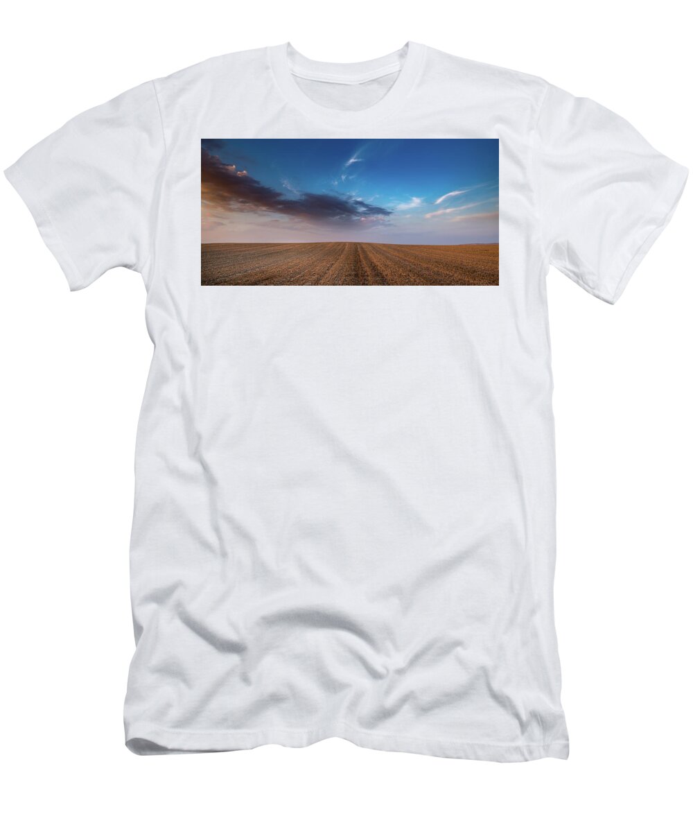 Nightfall T-Shirt featuring the photograph Agricultural meadow field and cloudy sky during sunset. by Michalakis Ppalis