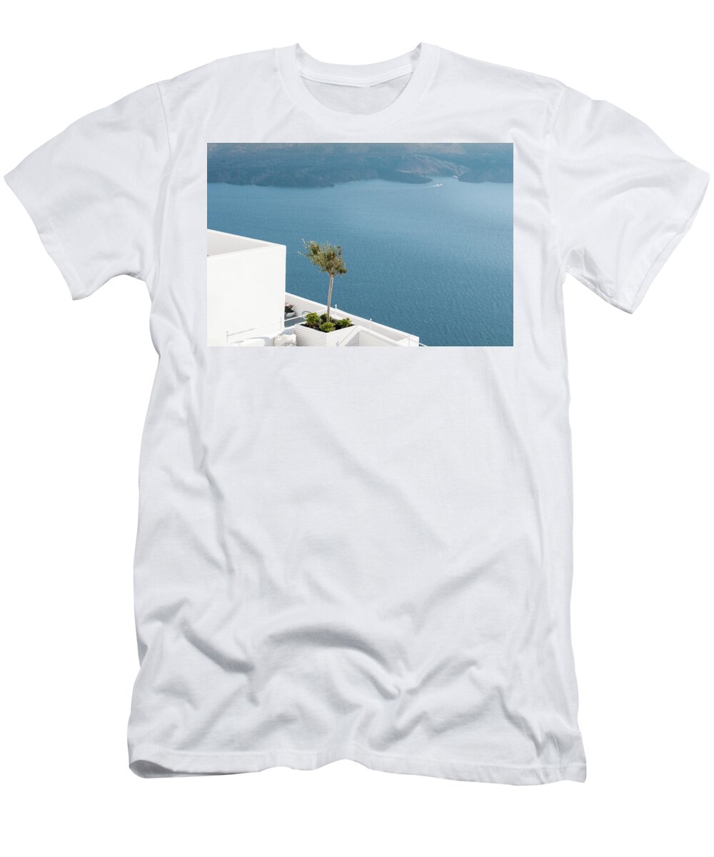 Santorini T-Shirt featuring the photograph Architectural details with olive tree at Oia in Santorini, Greece. by Michalakis Ppalis