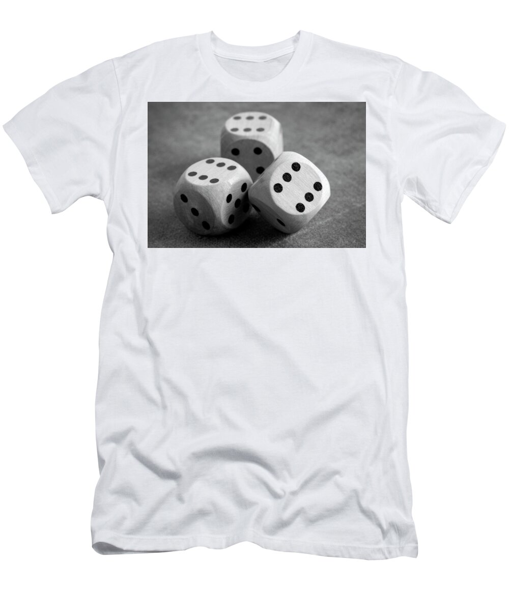 Dice T-Shirt featuring the photograph Close Up Of The Dices On Table In Black And White by Severija Kirilovaite