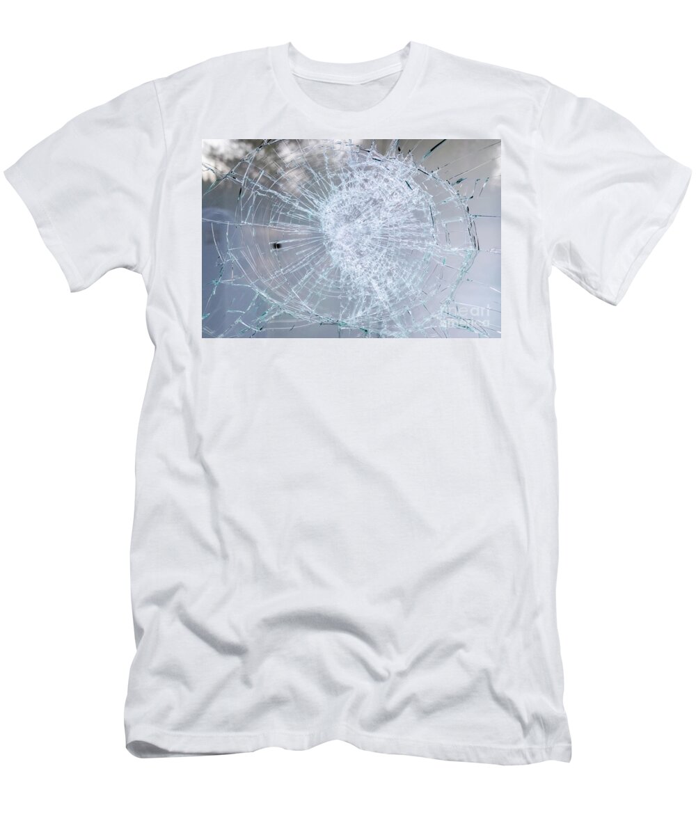 Accident T-Shirt featuring the photograph Detail of a broken glass of a window. by Joaquin Corbalan