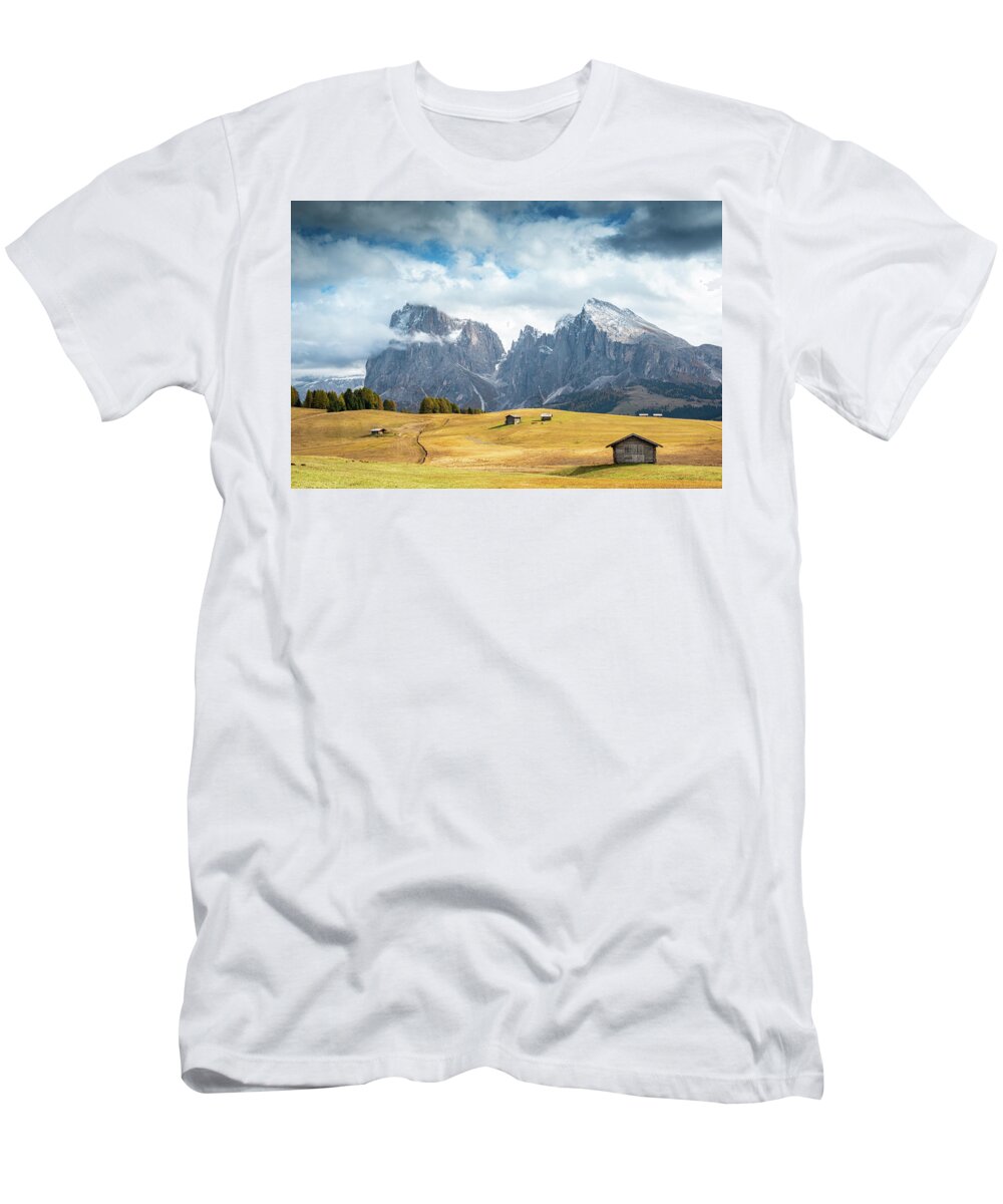 Mountain Landscape T-Shirt featuring the photograph Meadow field and the Dolomiti rocky peaks Alpe di siusi Seiser Alm Italy by Michalakis Ppalis