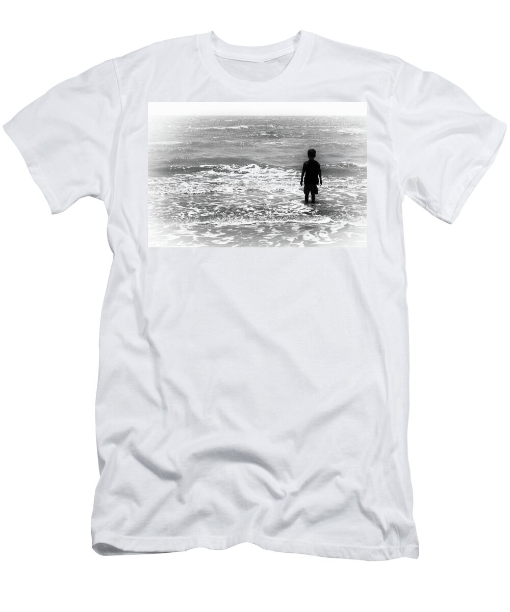 Surf T-Shirt featuring the photograph Kid Playing in the Surf by James C Richardson