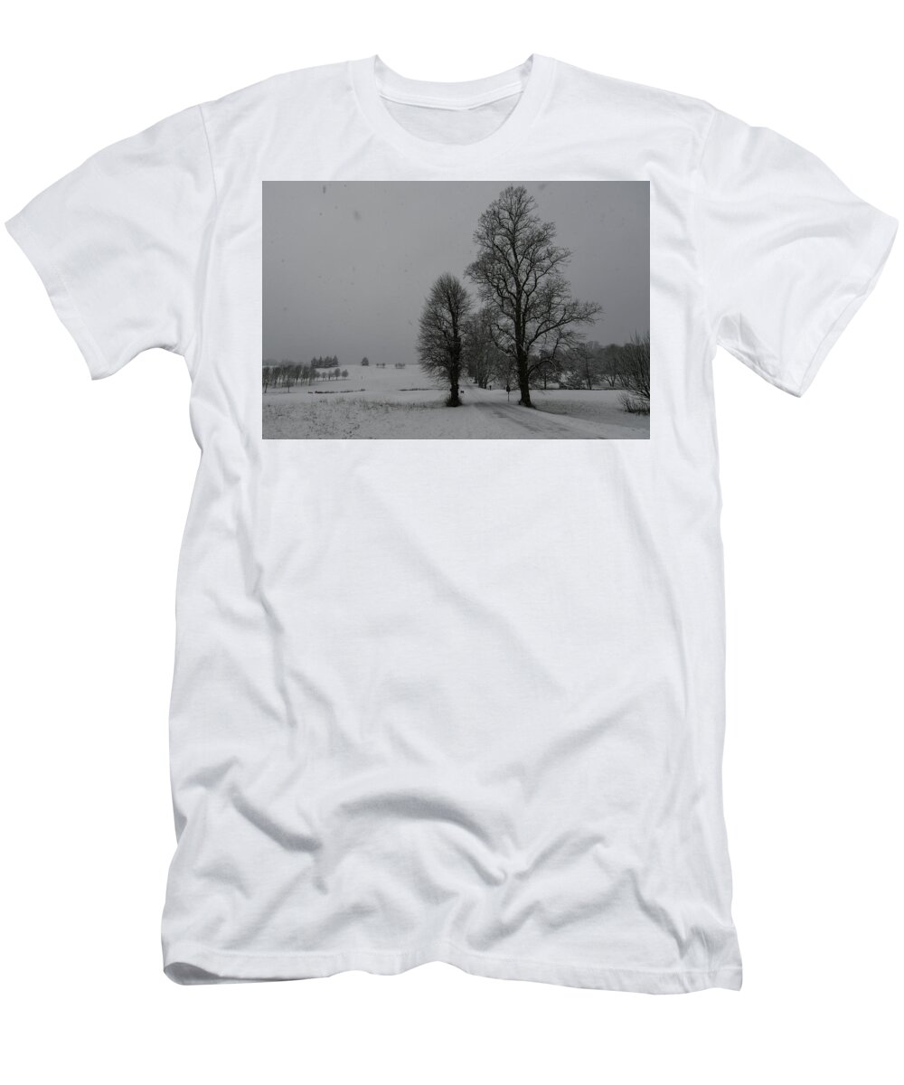 Herts T-Shirt featuring the photograph Trees in a snow storm by Andrew Lalchan