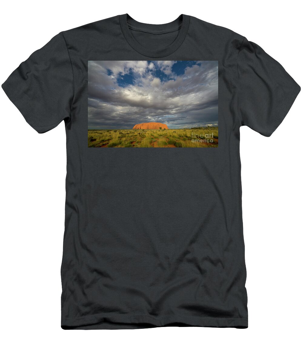 00477463 T-Shirt featuring the photograph Ayers Rock And Storm Clouds Australia by Yva Momatiuk John Eastcott