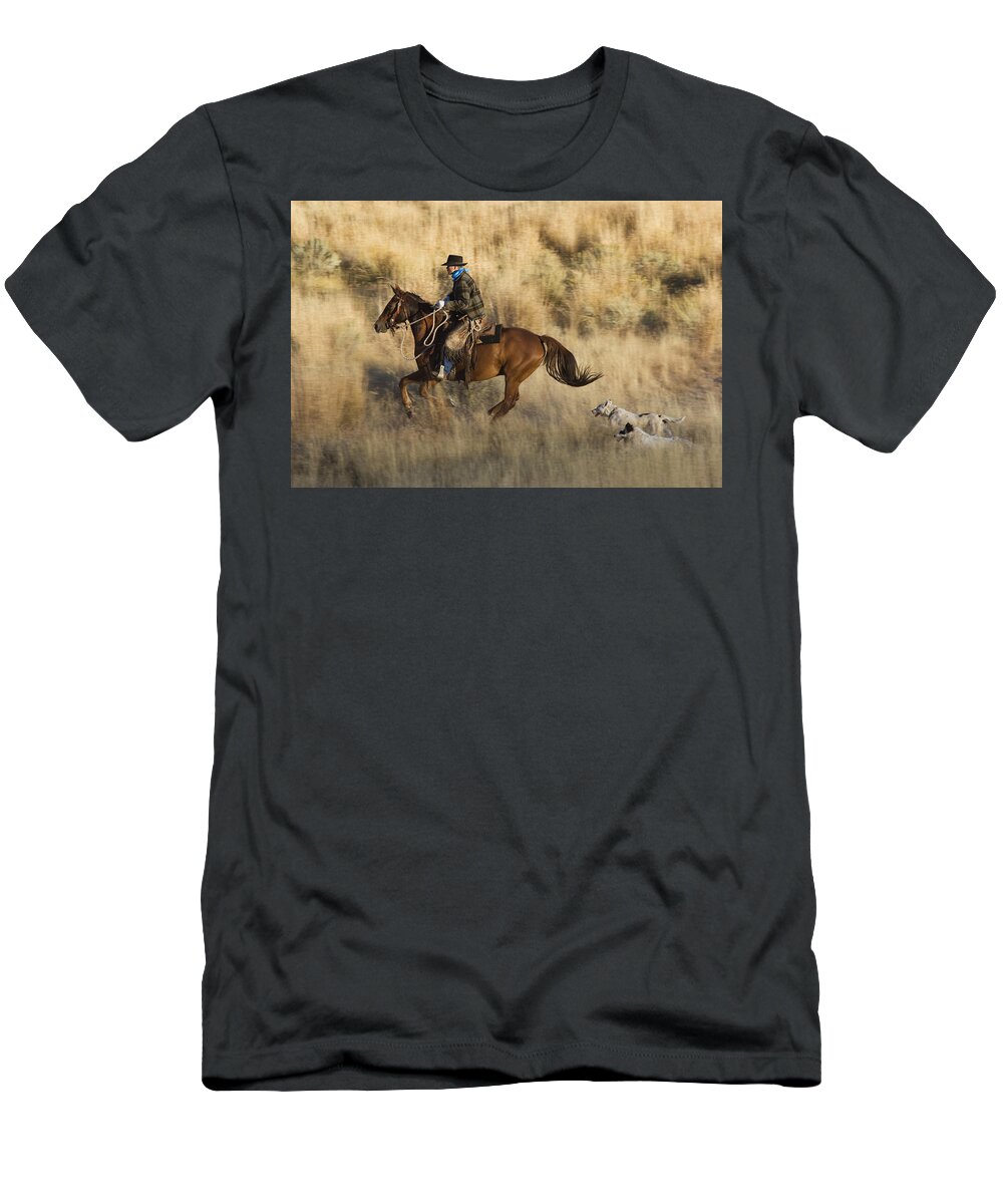 Feb0514 T-Shirt featuring the photograph Cowboy Riding With Dogs Oregon #1 by Konrad Wothe