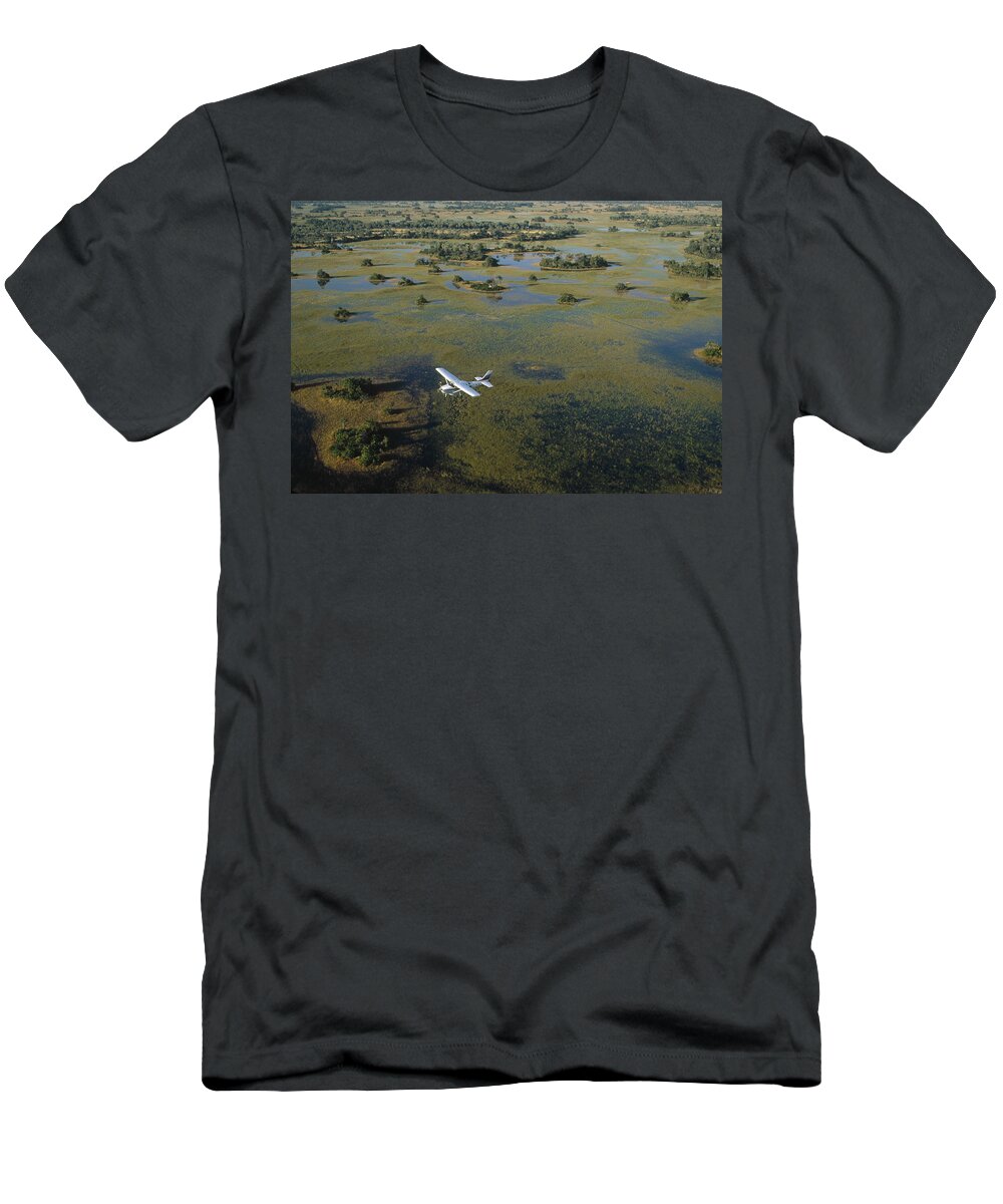 Feb0514 T-Shirt featuring the photograph Flight Safari Okavango Delta Botswana #1 by Konrad Wothe
