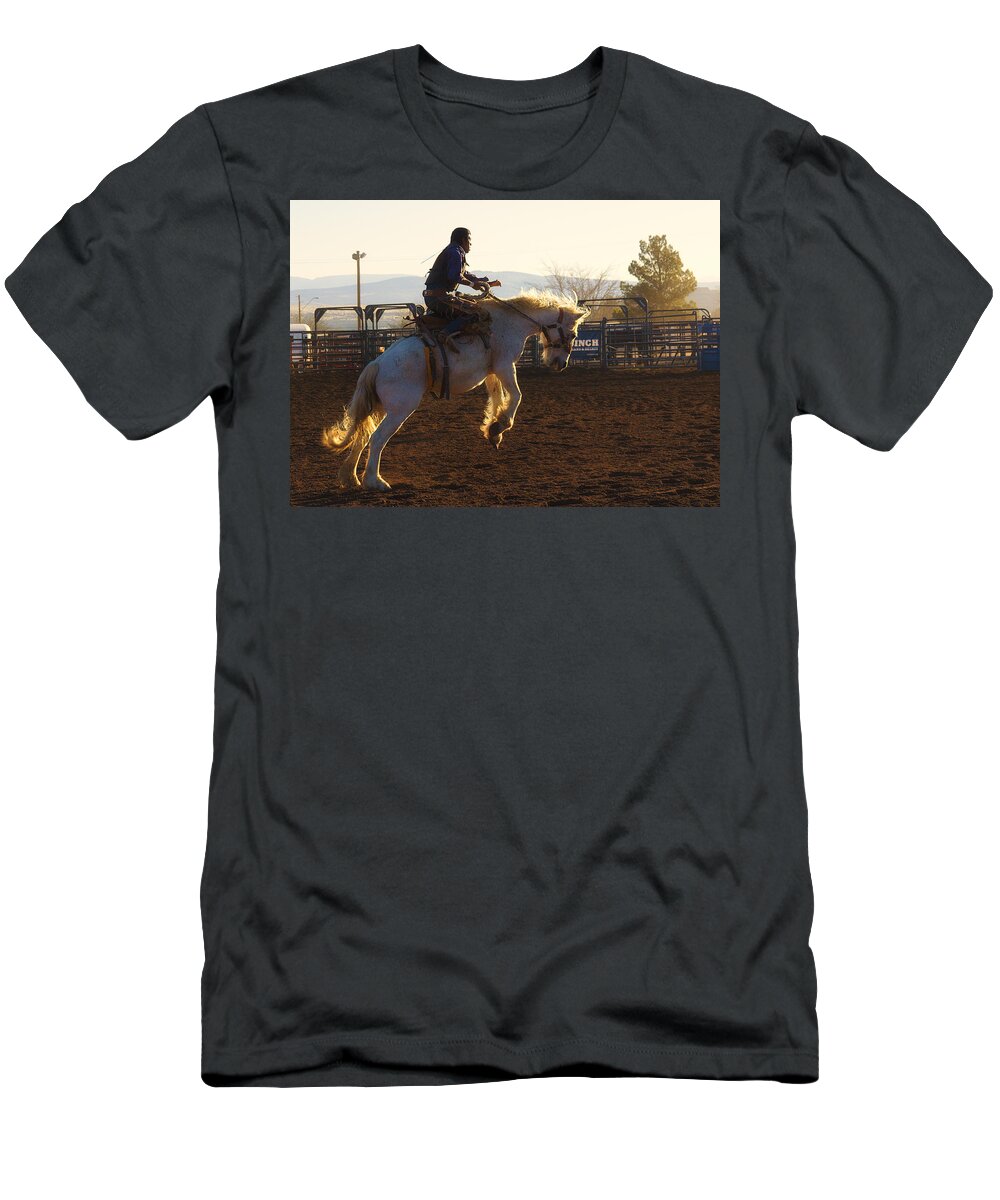 Rodeo T-Shirt featuring the photograph Backlit Bucking Bronco by Priscilla Burgers