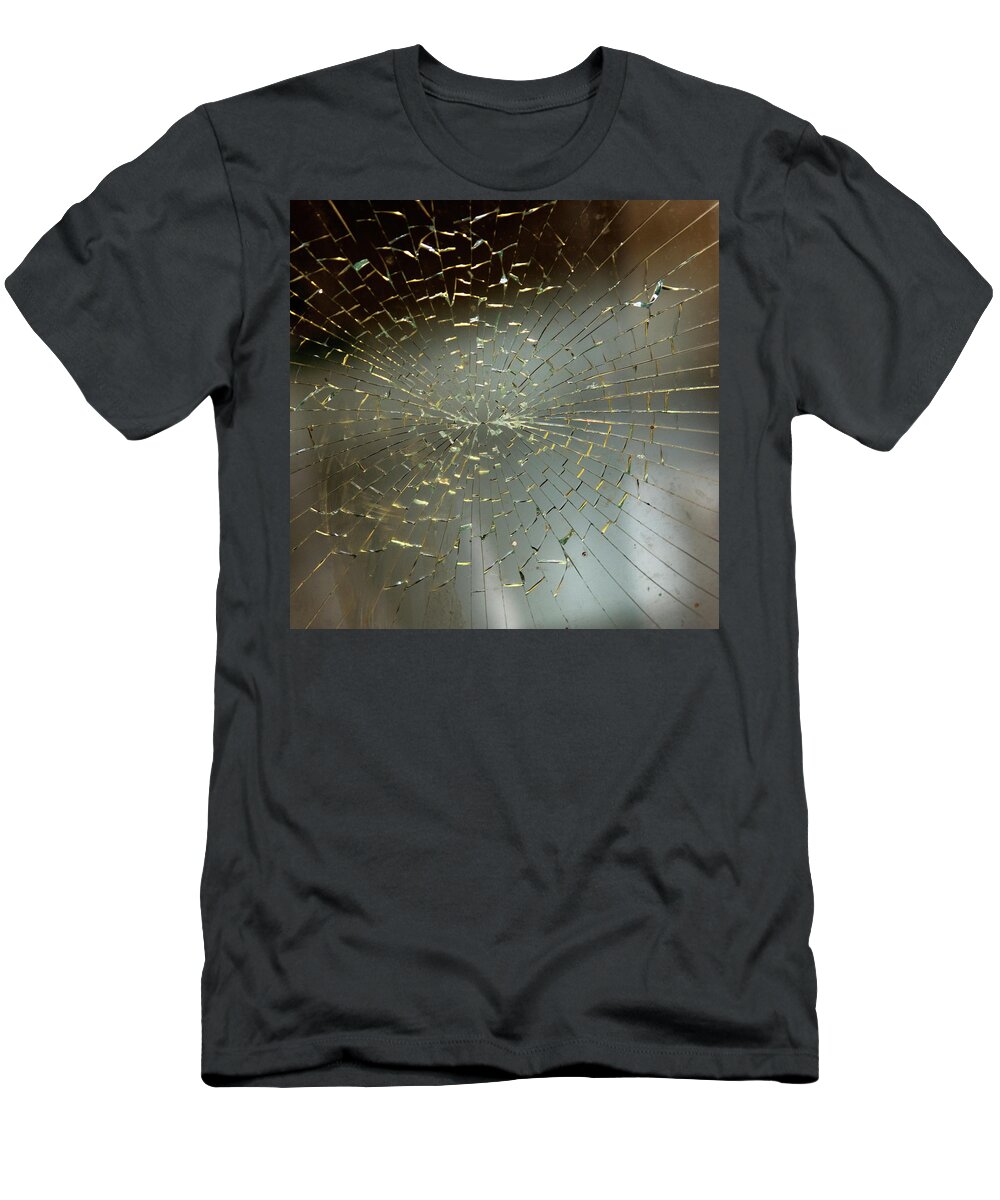 Bad Condition T-Shirt featuring the photograph Close-up Of Spiral Pattern In Cracked by Ron Koeberer