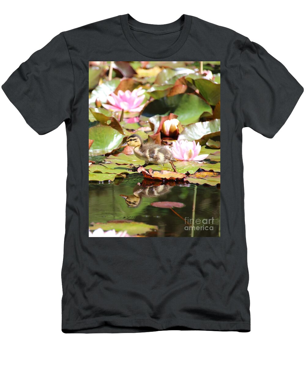 Ducklings T-Shirt featuring the photograph Duckling running over the Water Lilies 2 by Amanda Mohler