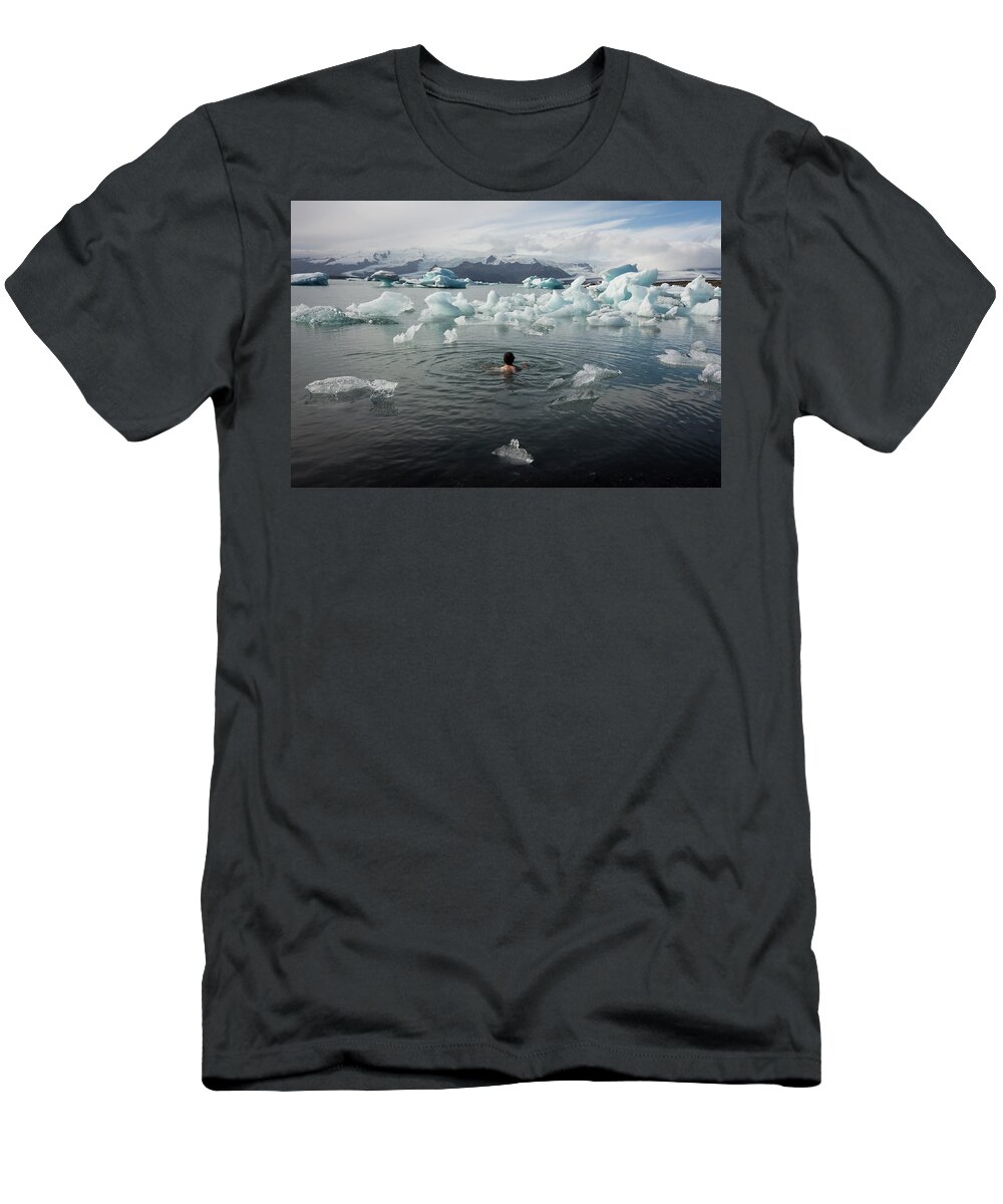 30-34 Years T-Shirt featuring the photograph Man Bathing In Glacier Lagoon by Dorin Bofan