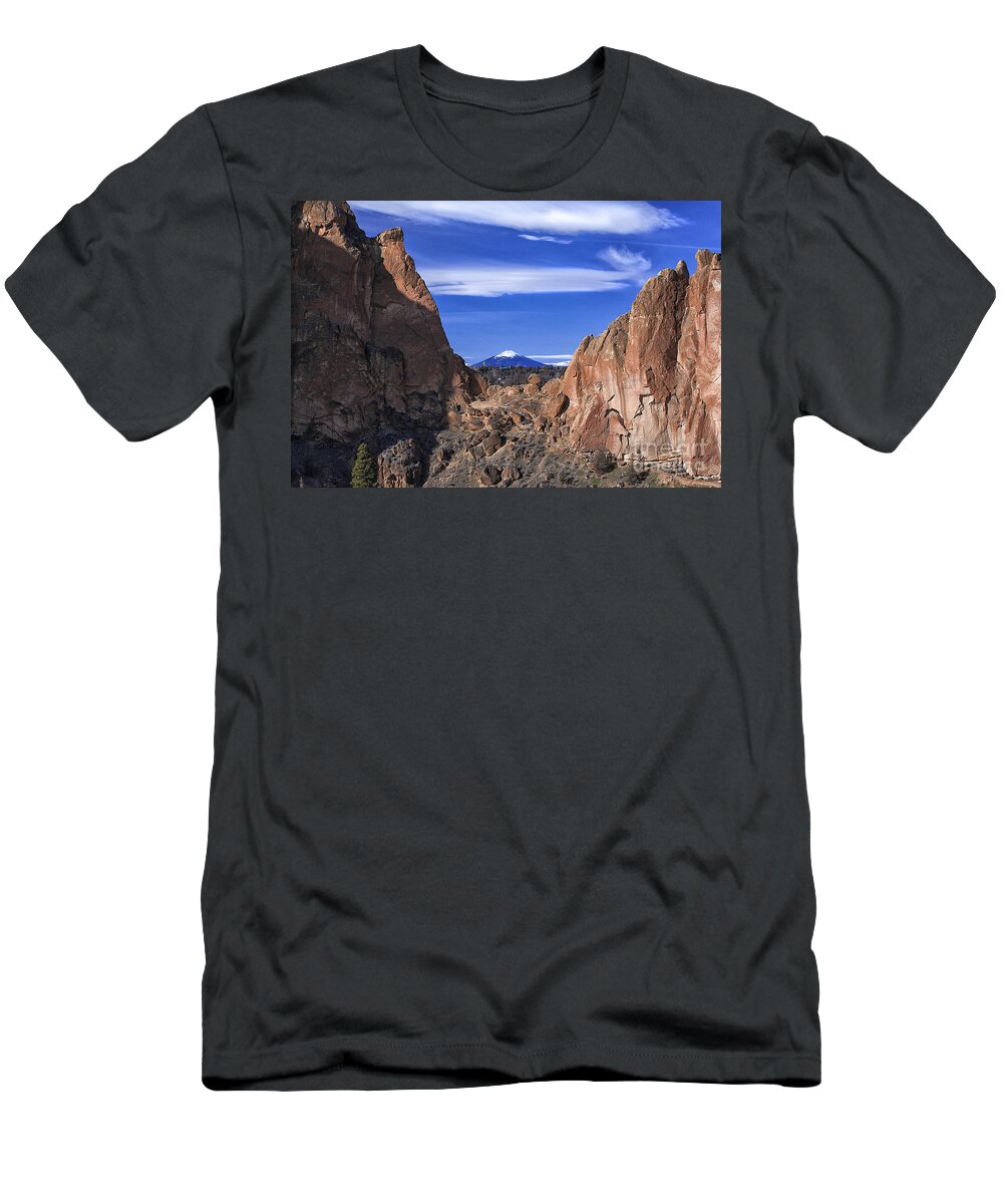 Scenic Blue Sky Rocky Mountain Cliffs Photography T-Shirt featuring the photograph Scenic Blue Sky View Between Smith Rock Mountain Rugged Cliffs by Jerry Cowart