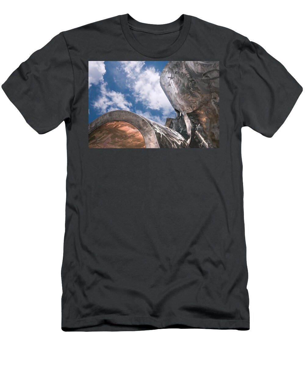 Mayo Park Rochester Minnesota Metal Sculpture Sky Clouds Blue White Silver Shine Shiny T-Shirt featuring the photograph Sculpture and Sky by Tom Gort