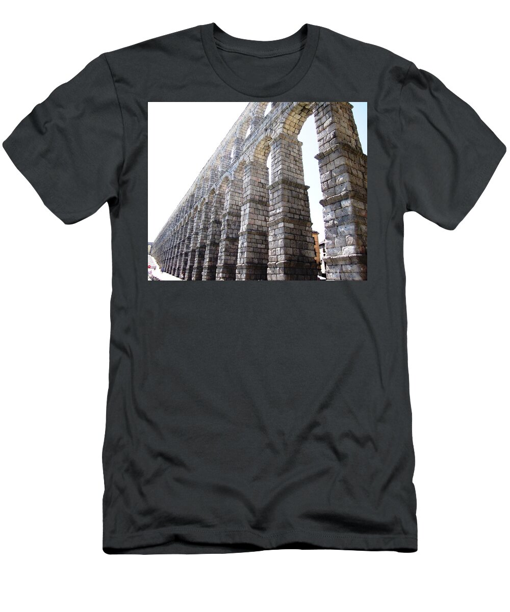 Segovia T-Shirt featuring the photograph Segovia Ancient Roman Aqueduct Architectural Granite Stone Structure II With Arches in Spain by John Shiron