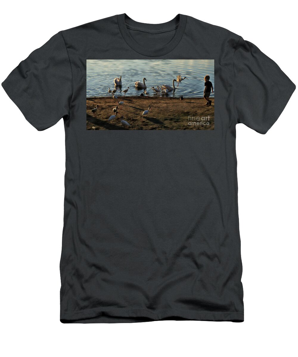 Marcia Lee Jones T-Shirt featuring the photograph Boy Feeding Swans and White Ibis by Marcia Lee Jones