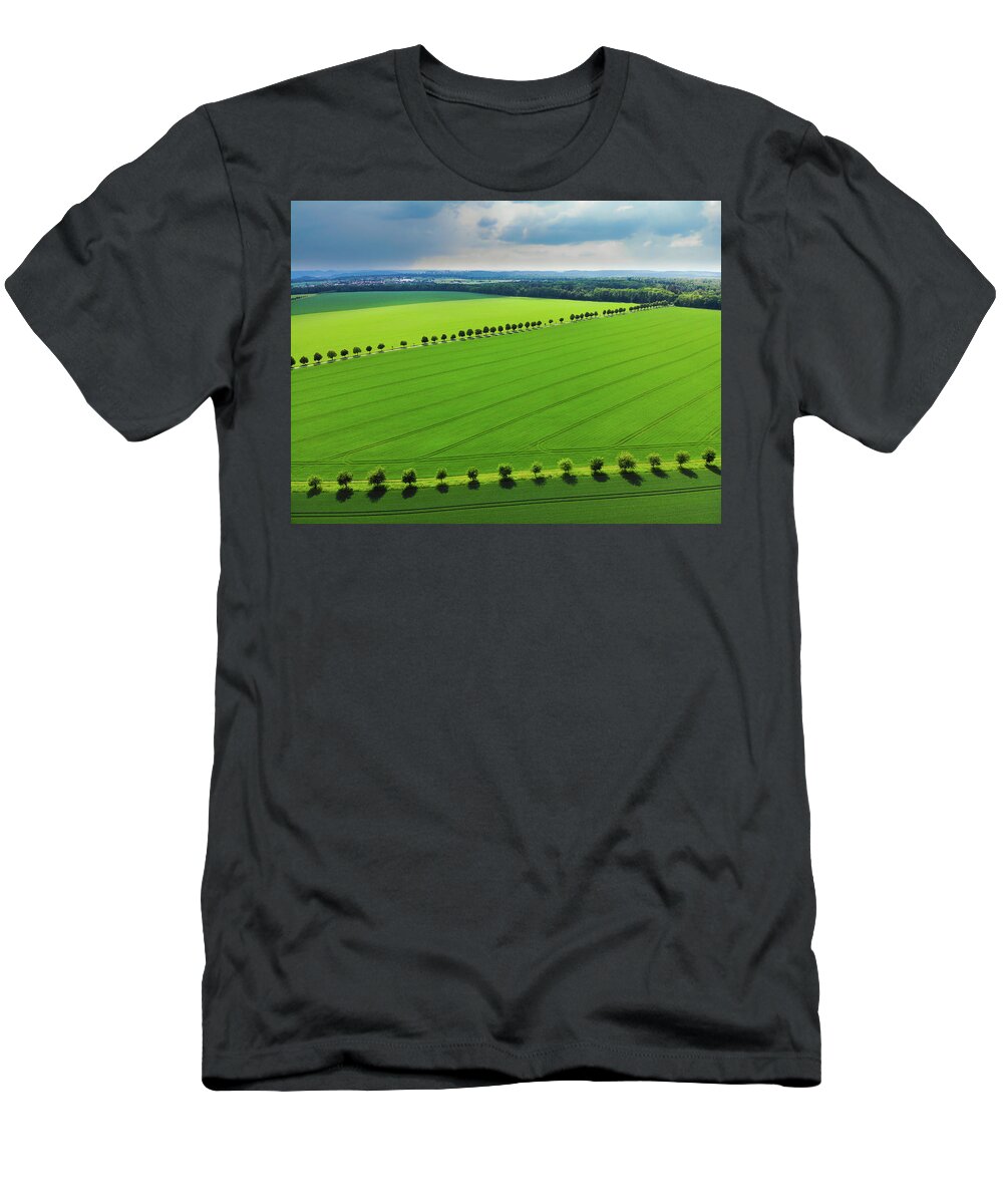 Green T-Shirt featuring the photograph Bright green landscape with fields and trees by Matthias Hauser