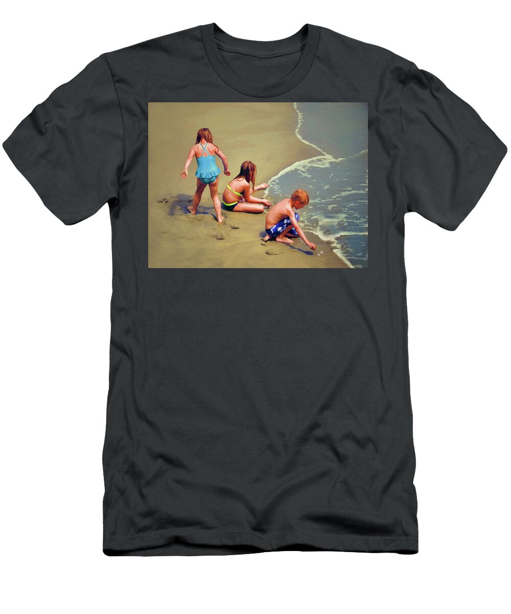 Childrens Shell Hunting At The Beach T-Shirt featuring the photograph Childrens Shell Hunting At The Beach by Sandi OReilly