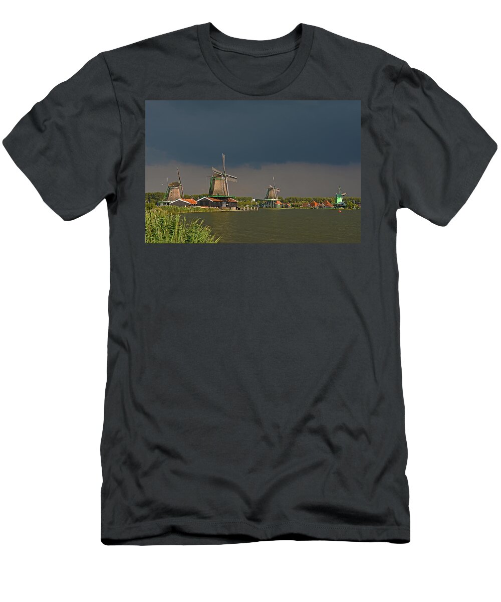 Windmill T-Shirt featuring the photograph Dark clouds above Zaanse Schans by Frans Blok