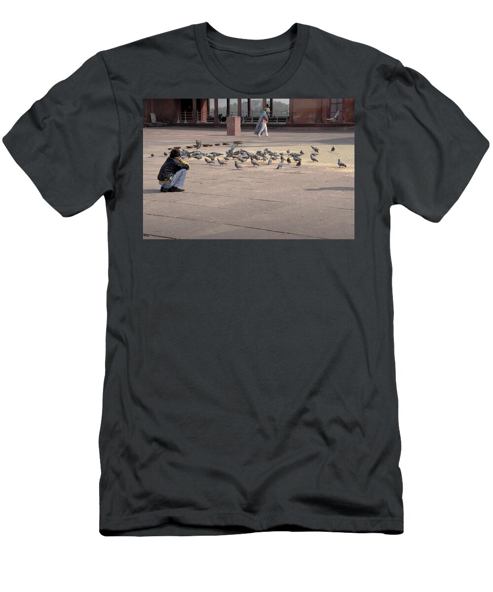 Pigeons T-Shirt featuring the photograph Feeding pigeons in Delhi mosque. by Elena Perelman
