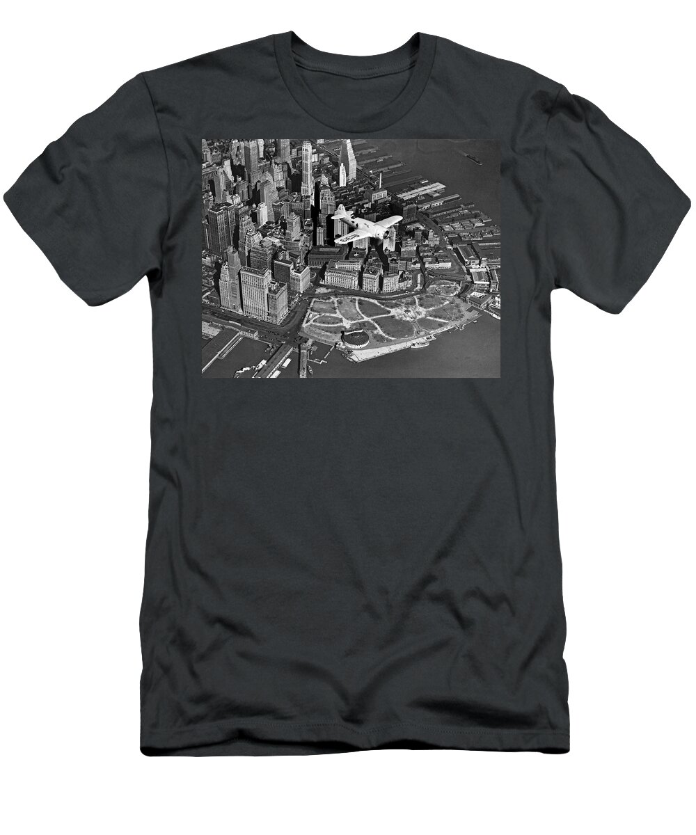 1930's T-Shirt featuring the photograph Hawk's Plane Over Battery Park by Underwood Archives