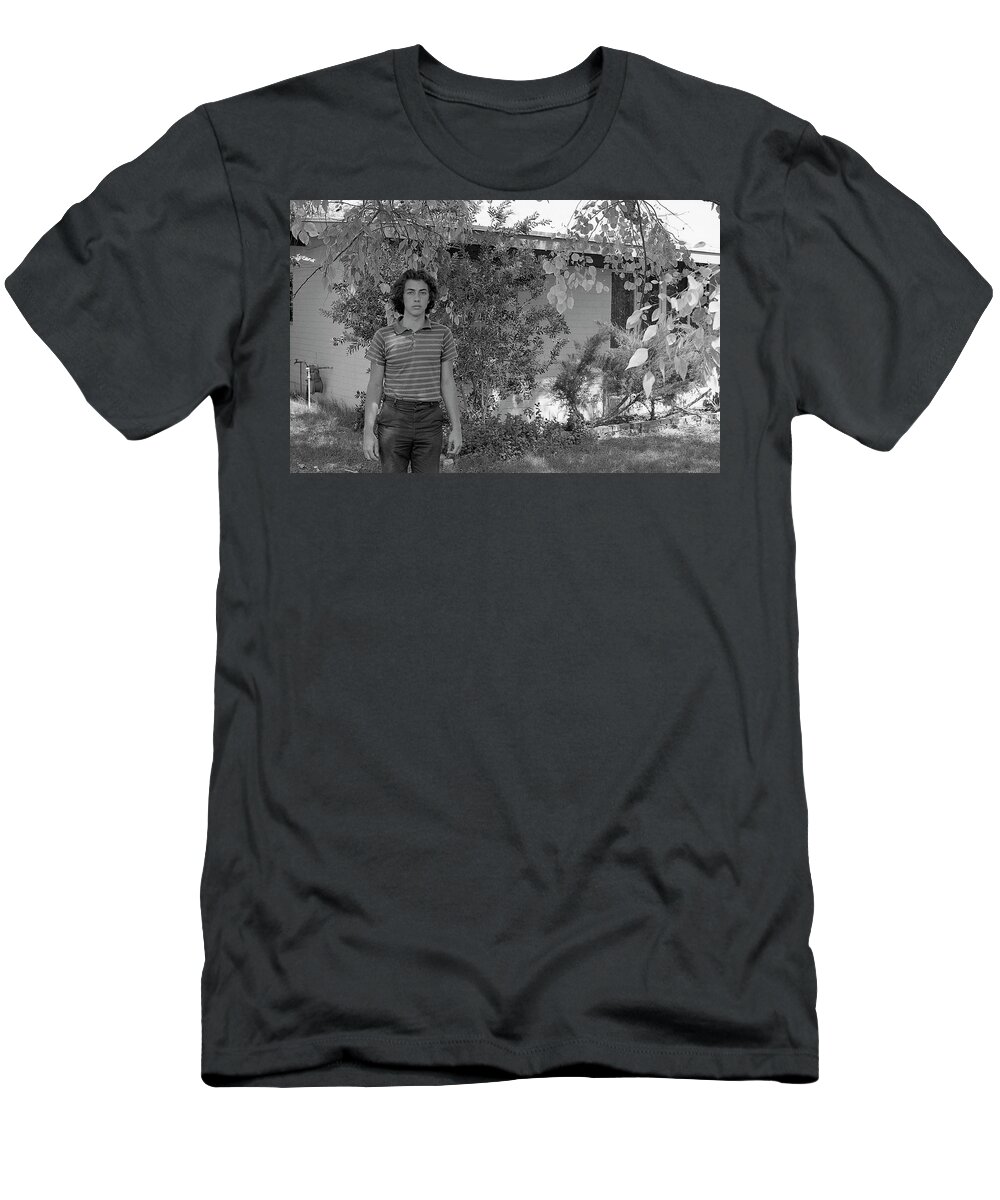 Phoenix T-Shirt featuring the photograph Man in Front of Cinder-block Home, 1973 by Jeremy Butler