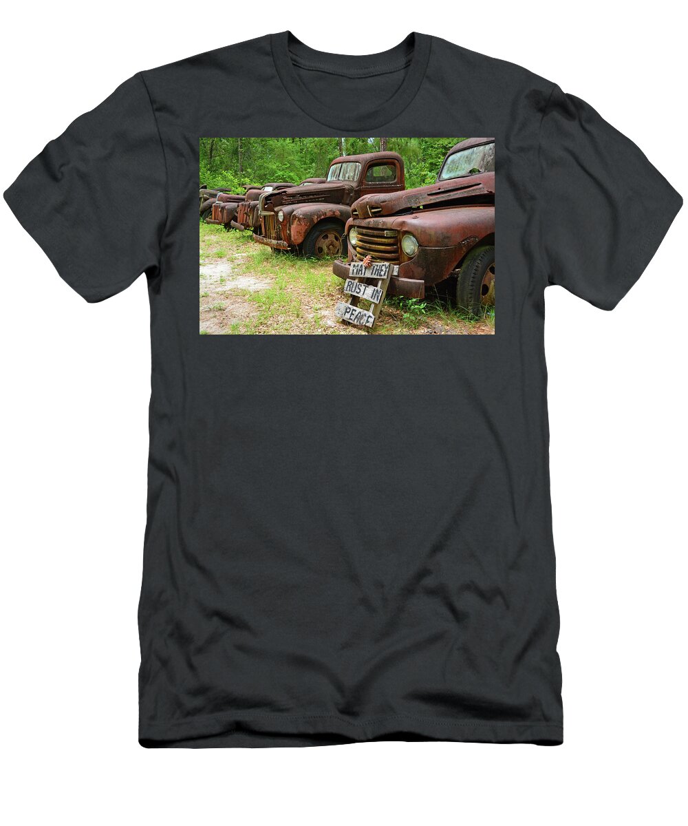 Pat Harvey's Truck Graveyard T-Shirt featuring the photograph May They Rust in Peace by Ben Prepelka