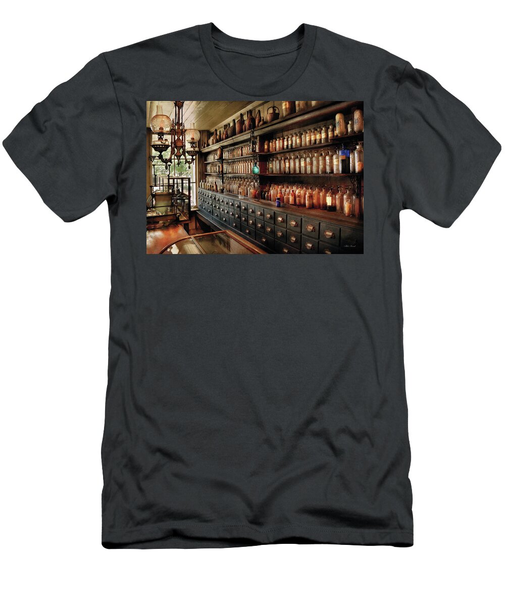 Pharmacy T-Shirt featuring the photograph Pharmacy - So many drawers and bottles by Mike Savad